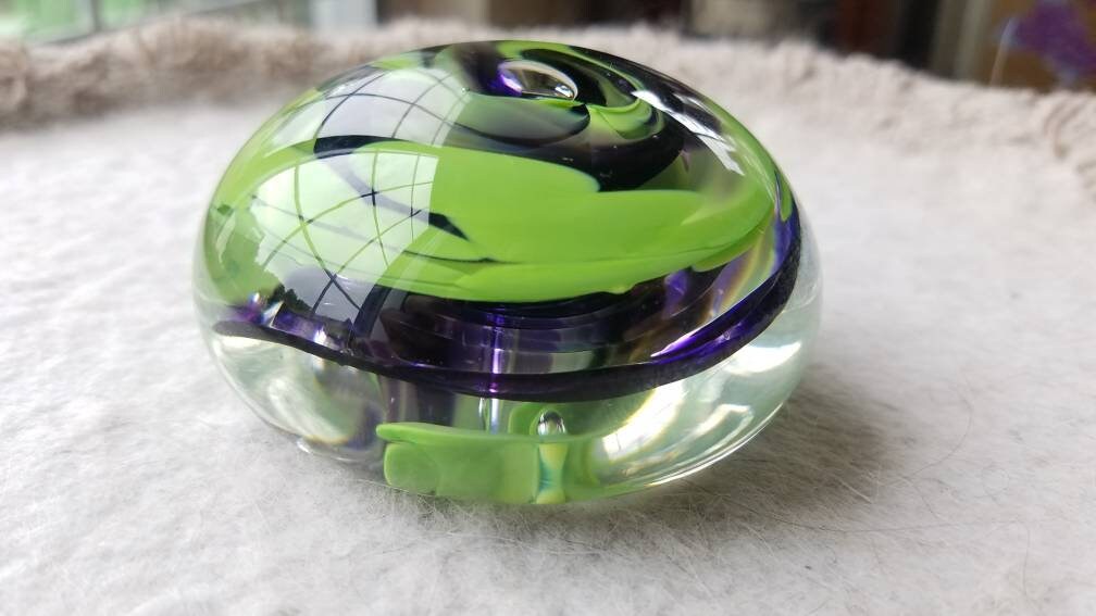 Green and purple paper weight