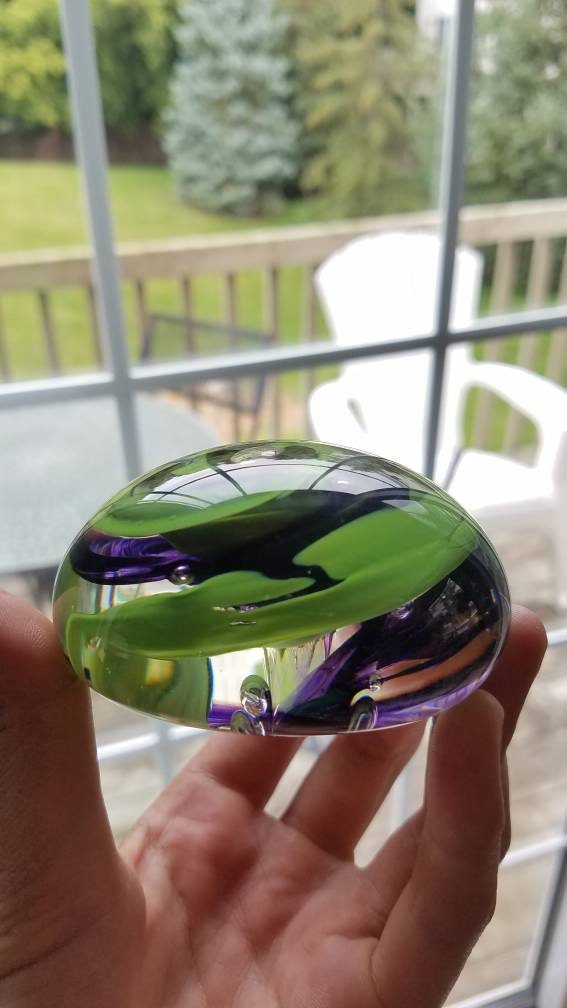 Green and purple paper weight